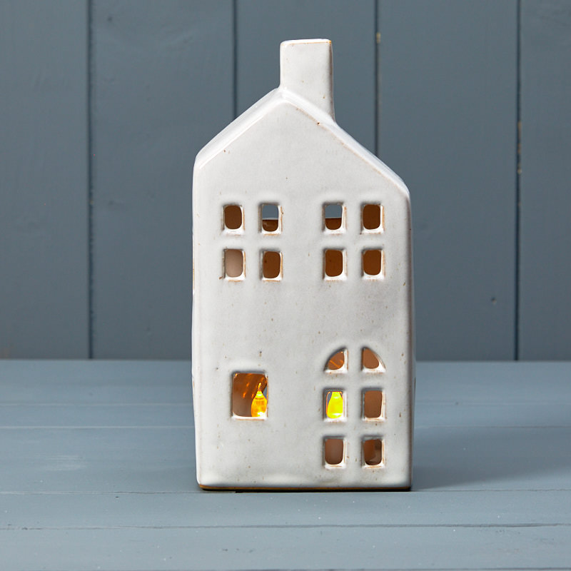 Pale grey ceramic tealight house detail page